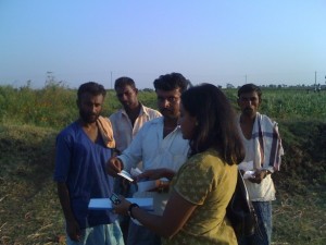 Deepa working on ground with the Fasal Team