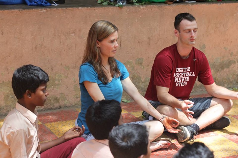 Volunteers and students during a yoga session