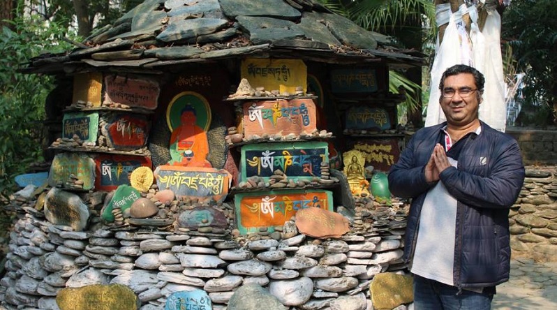 Tikku praying for hope in Nepal