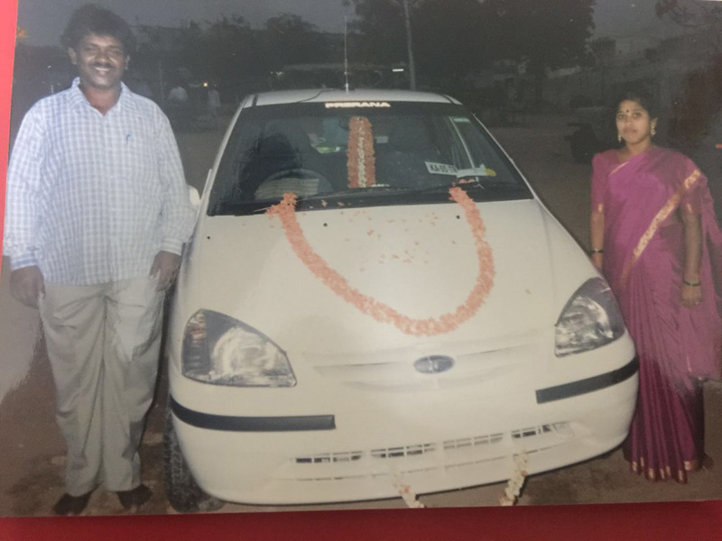 Renuka with his wife and the first car he bought.