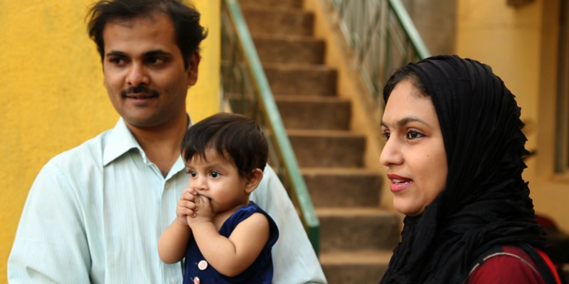 Muzzakir with his wife and daughter.