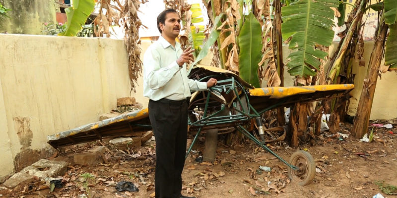 Muzzakir with the aircraft he built when he was in school.