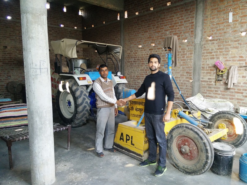 Alekh with one of the farmers